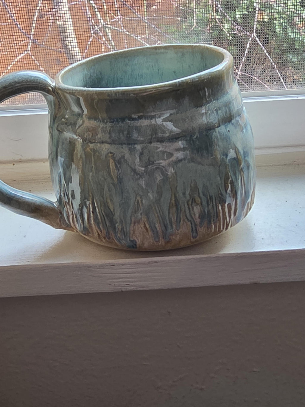 Pottery Mugs in multi colored glaze