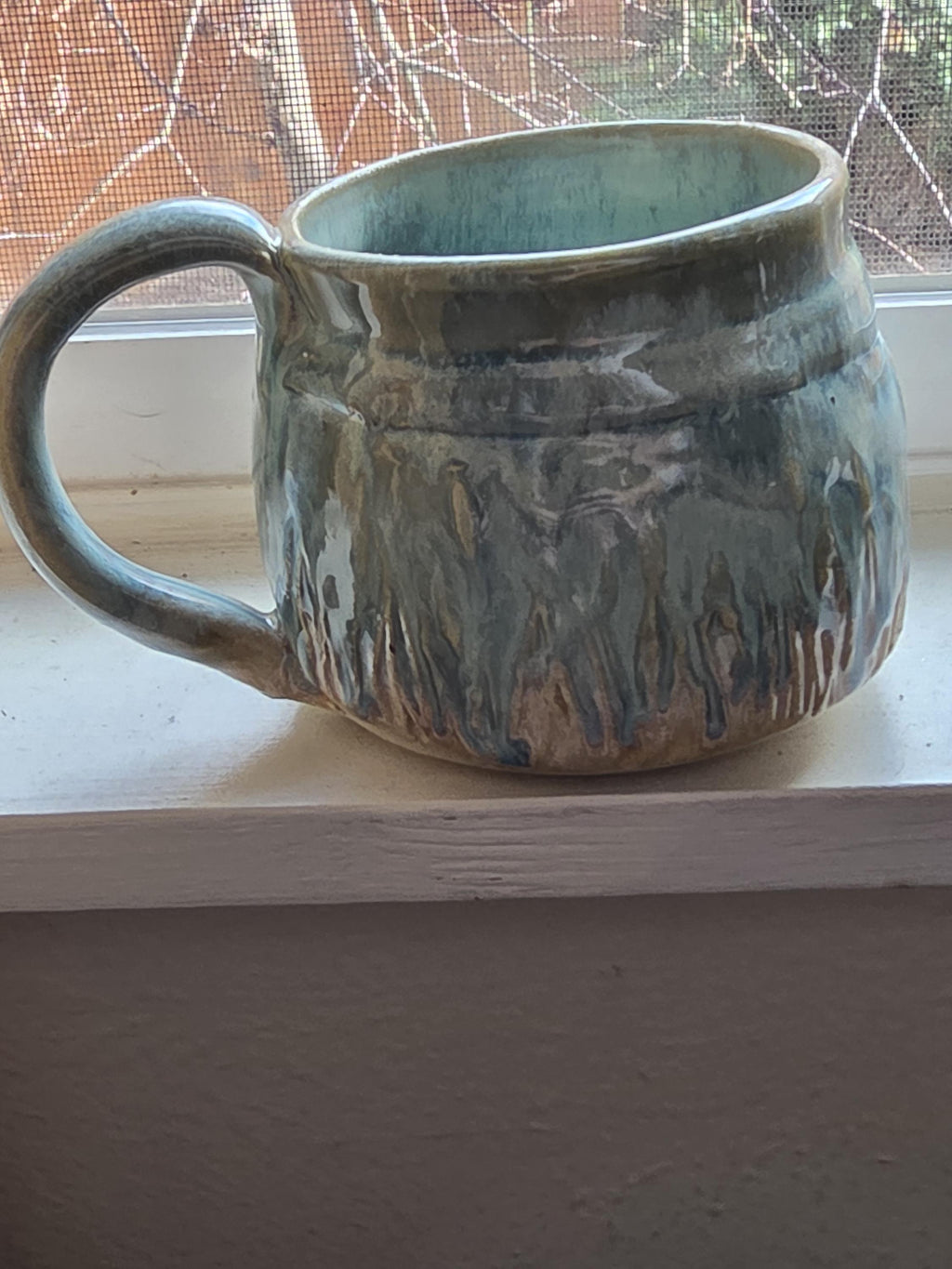 Pottery Mugs in multi colored glaze