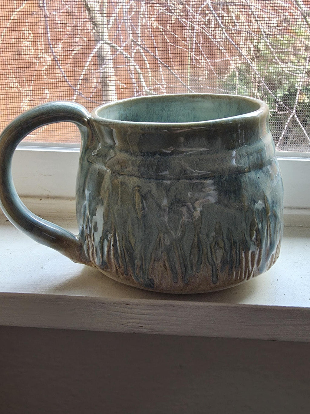 Pottery Mugs in multi colored glaze