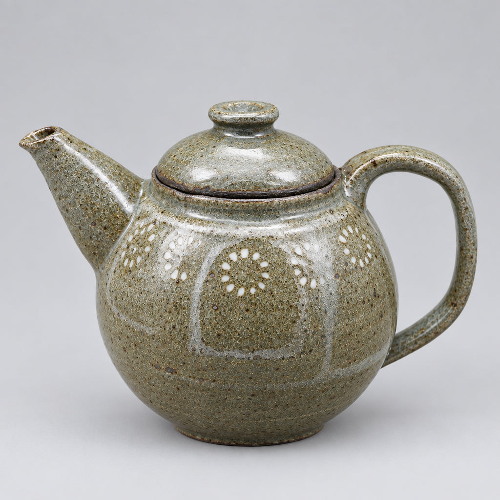Beautiful handmade Teapot with slip inlay. Brown speckled clay with white desgin. Perfect for the tea lover in your life!
