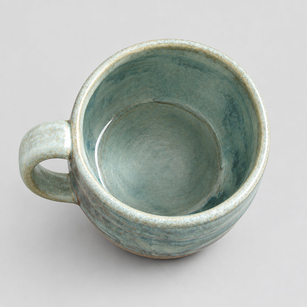 Pottery Mugs in multi colored glaze